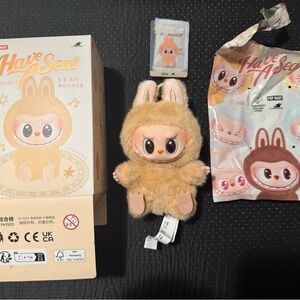 The Monsters Labubu BABA have a seat